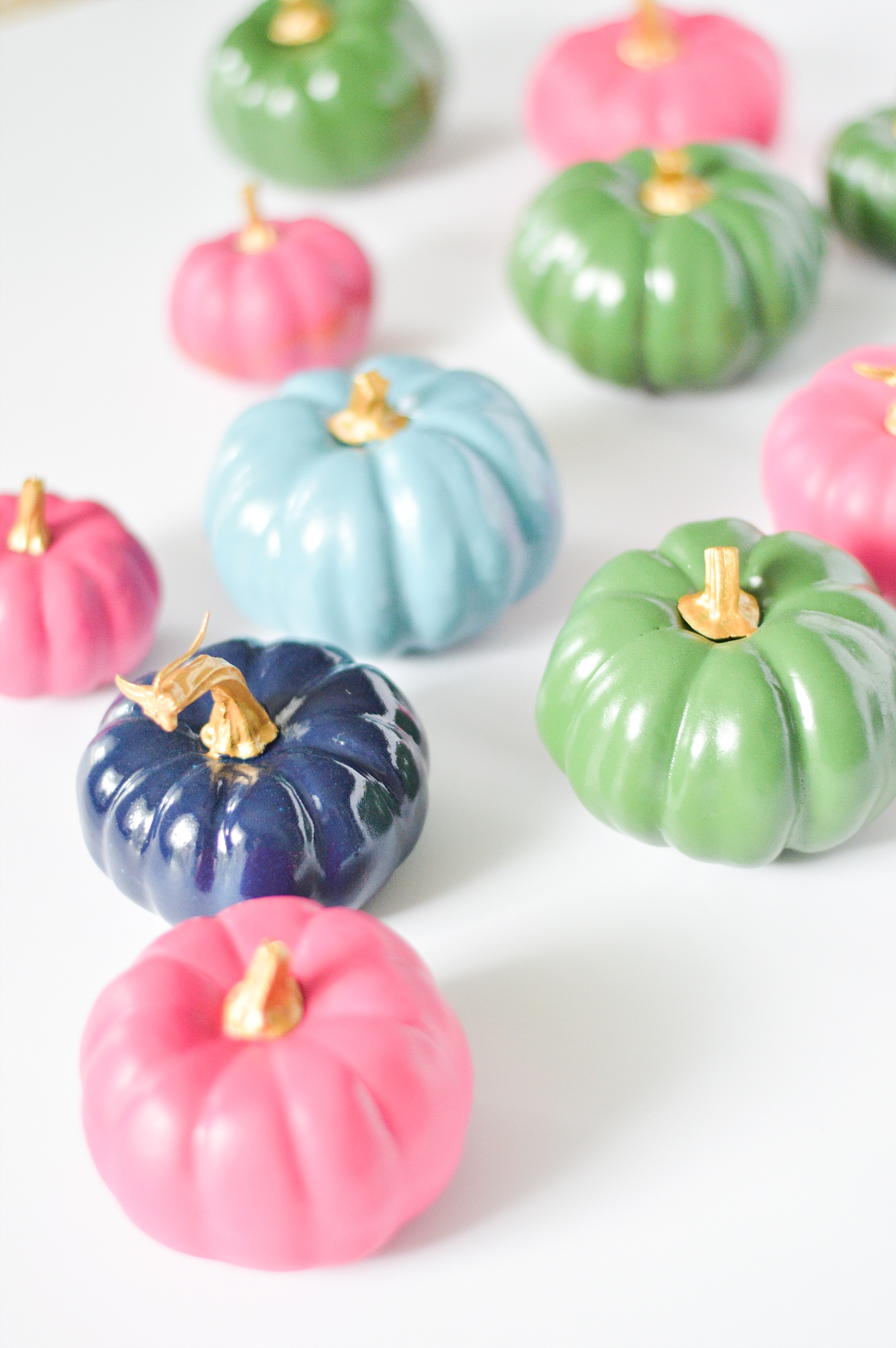 DIY painted craft store pumpkins for colorful fall table decor, pink, navy, blue, gold, and green, Fall Home Decor