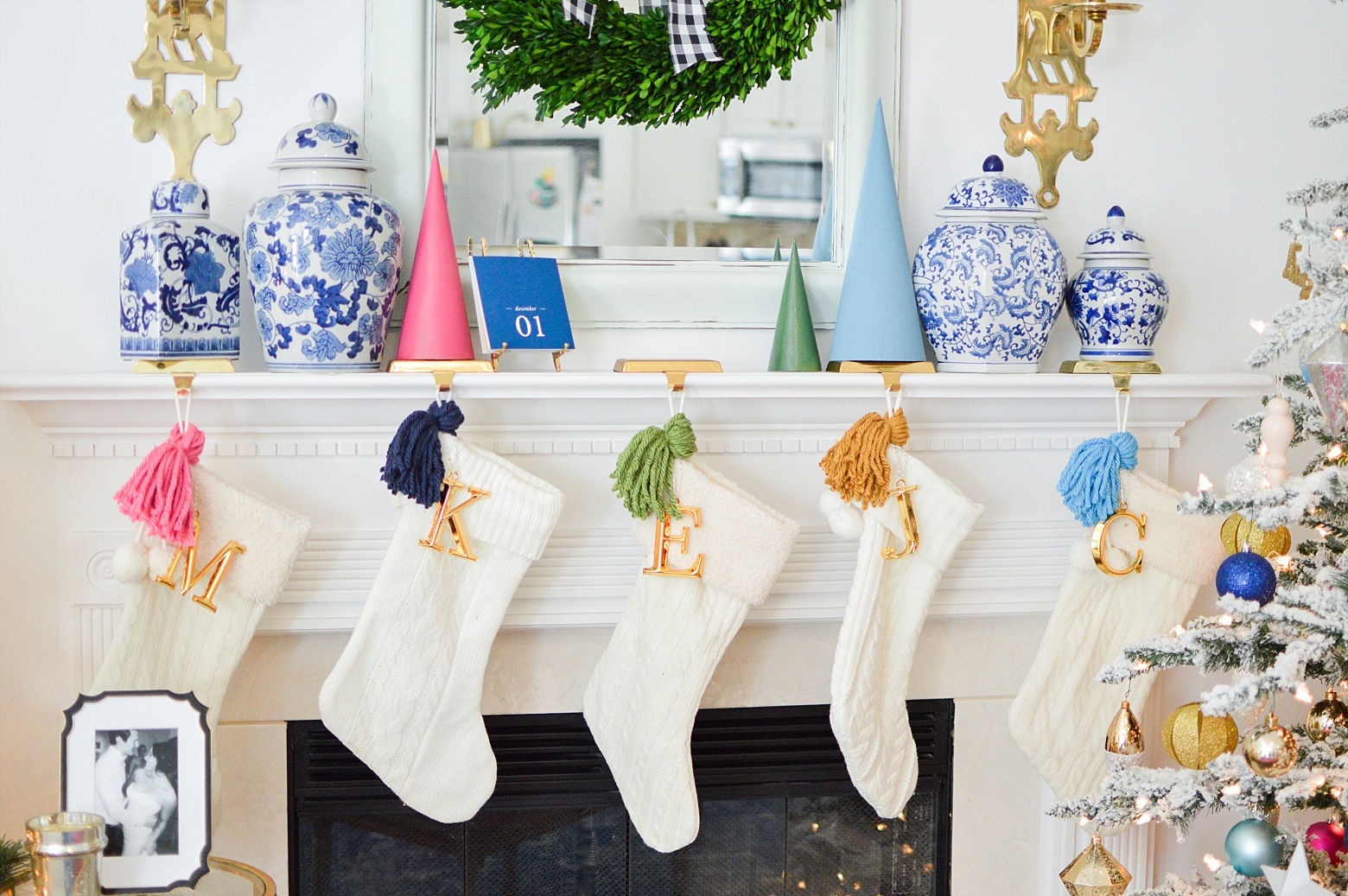 A Modern Colorful Christmas Home Tour on Megan Martin Creative, White Sweater stockings, DIY tassels, Christmas mantel decorations, chinoiserie holiday