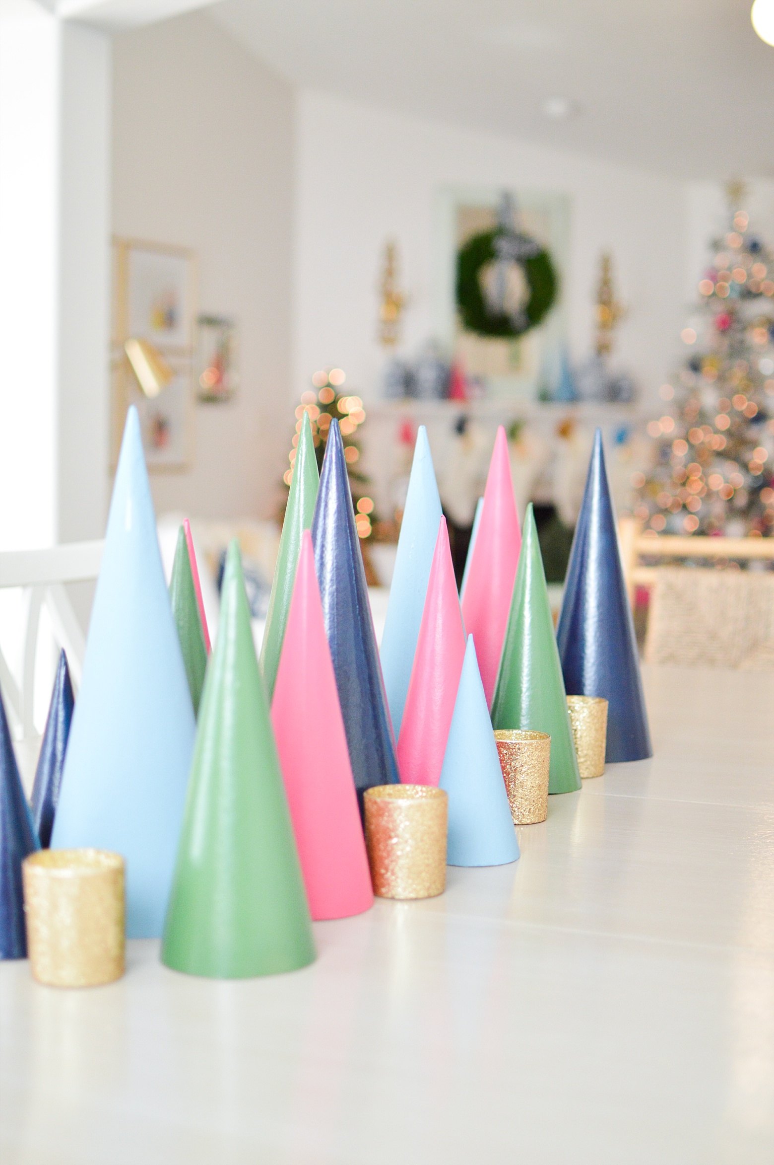 DIy painted Christmas trees table centerpiece, Modern Colorful Christmas home tour by Megan Martin Creative, holiday decorations, pink navy green gold
