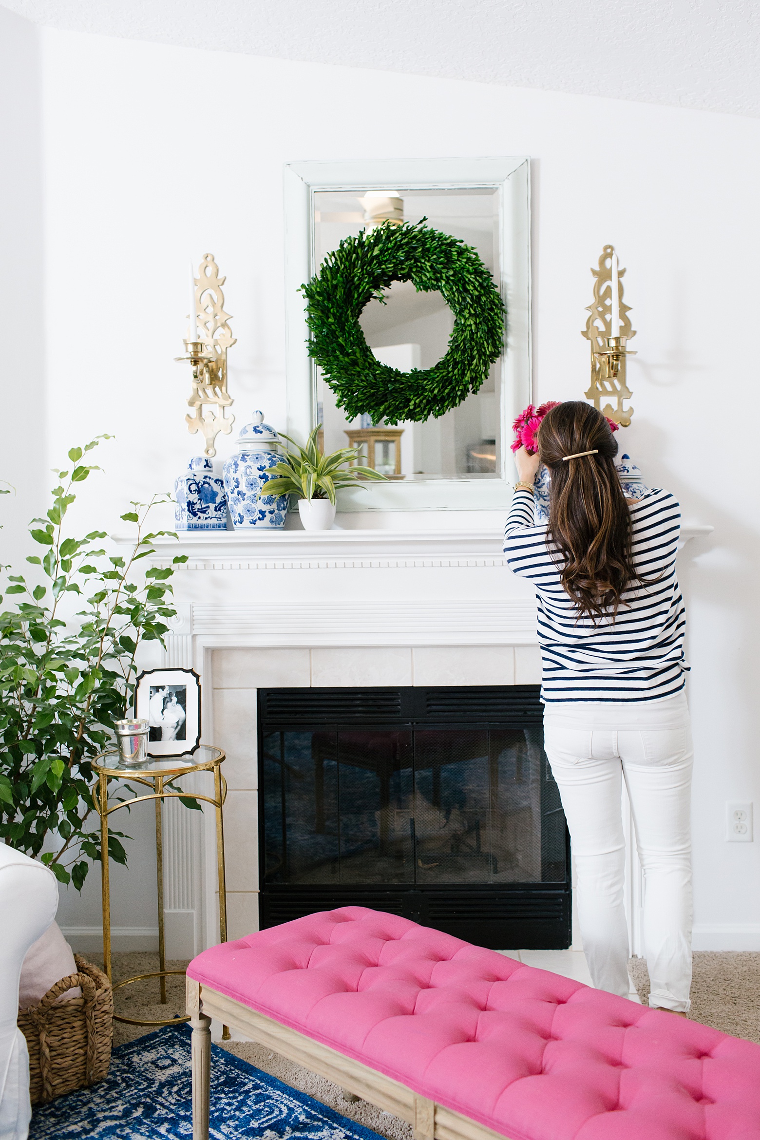 bright and colorful living room with family friendly details in navy, pink, green, and gold! Designed by Megan Martin Creative